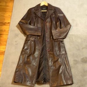 Brown leather Zara woman’s long line jacket.